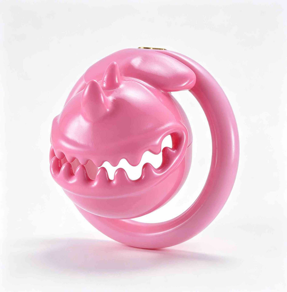 Pink Monster Mouth chastity cage from an angled view