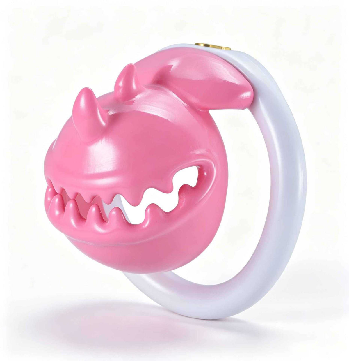 Pink and white Monster Mouth chastity cage from an angled view