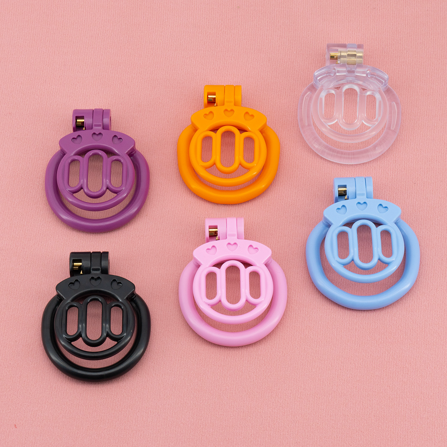 Plastic Mini Chastity Cage with 4 Base Rings