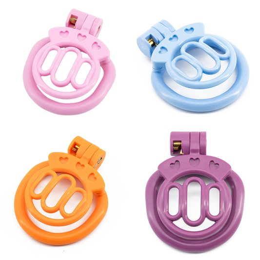 Plastic Mini Chastity Cage with 4 Base Rings