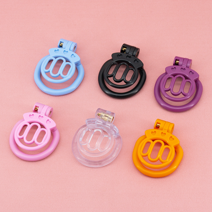 Plastic Mini Chastity Cage with 4 Base Rings