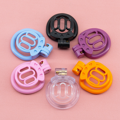 Plastic Mini Chastity Cage with 4 Base Rings